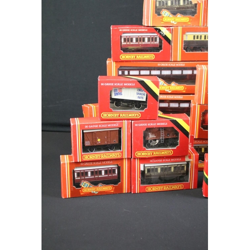 130 - 41 Boxed Hornby OO gauge items of rolling stock to include coaches, vans and wagons featuring R413 O... 