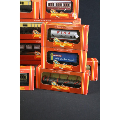 130 - 41 Boxed Hornby OO gauge items of rolling stock to include coaches, vans and wagons featuring R413 O... 