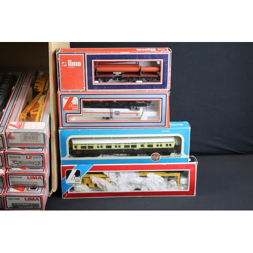 133 - 18 Boxed Lima OO gauge items of rolling stock to include coaches, car transporters and tankers, some... 