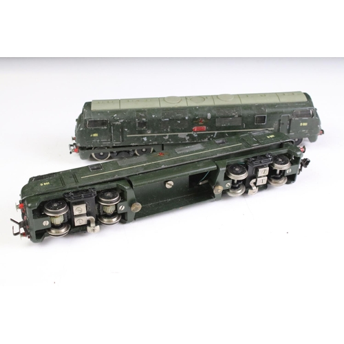 143 - Two HO / OO gauge metal D801 BR Diesel locomotives in green, both unmarked, showing paint wear