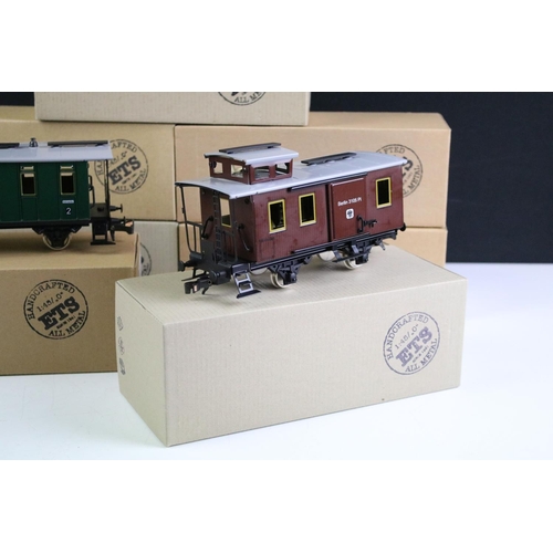 250 - Seven boxed ETS O Gauge CSD Series items of rolling stock to include 301 green coach, 302 green coac... 