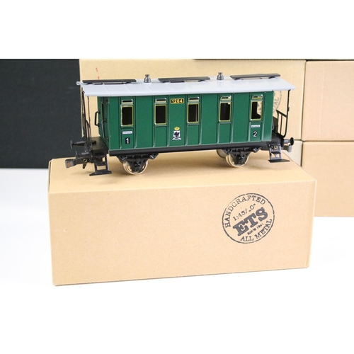 250 - Seven boxed ETS O Gauge CSD Series items of rolling stock to include 301 green coach, 302 green coac... 