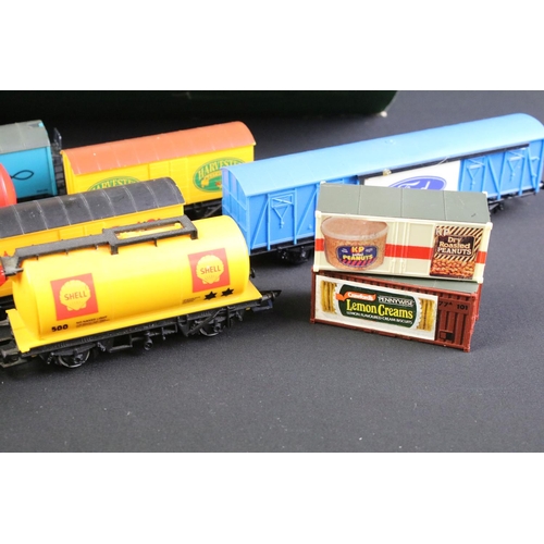 253 - 65 OO gauge items of rolling stock to include Hornby, Lima, Triang etc featuring wagons, vans and ta... 