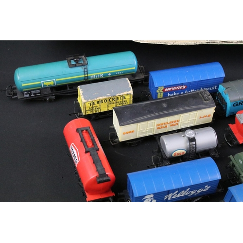 253 - 65 OO gauge items of rolling stock to include Hornby, Lima, Triang etc featuring wagons, vans and ta... 