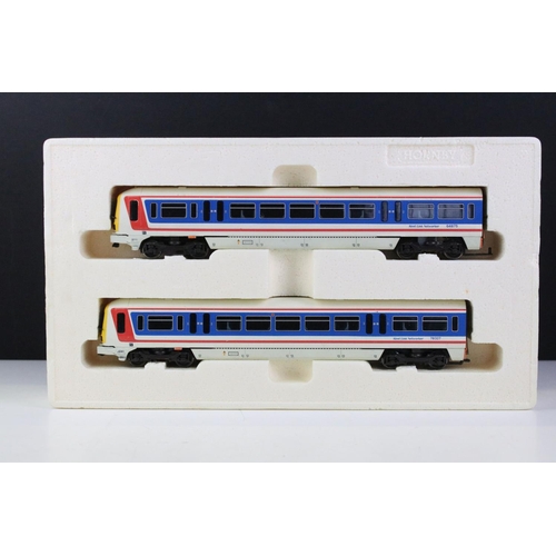 48 - Two boxed OO gauge train packs to include Lima Golden Series 14 9742 GP and Hornby R2001 Networker S... 