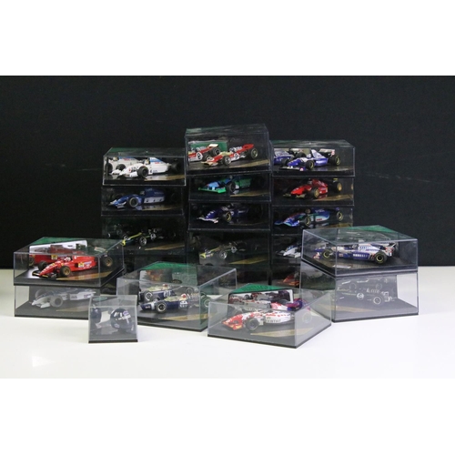 1025 - 20 Cased Heritage Formula 1 diecast model cars plus a Heritage Classics Damon Hill helmet, all varia... 