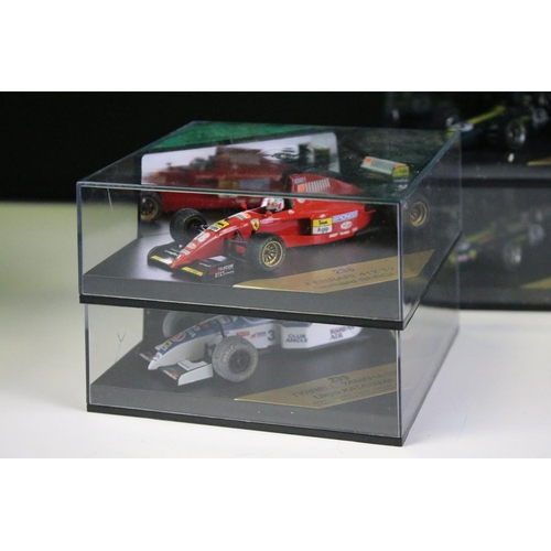 1025 - 20 Cased Heritage Formula 1 diecast model cars plus a Heritage Classics Damon Hill helmet, all varia... 