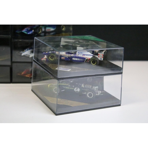 1025 - 20 Cased Heritage Formula 1 diecast model cars plus a Heritage Classics Damon Hill helmet, all varia... 