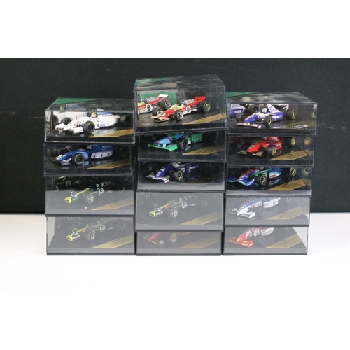 1025 - 20 Cased Heritage Formula 1 diecast model cars plus a Heritage Classics Damon Hill helmet, all varia... 