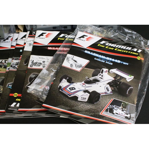 1065 - 35 Cased Panini F1 Formula 1 Car Collection diecast models along with 17 x corresponding magazines, ... 