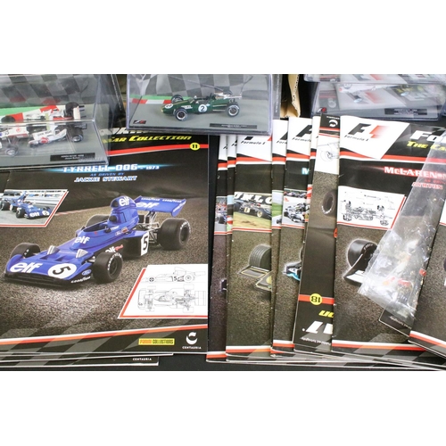 1065 - 35 Cased Panini F1 Formula 1 Car Collection diecast models along with 17 x corresponding magazines, ... 