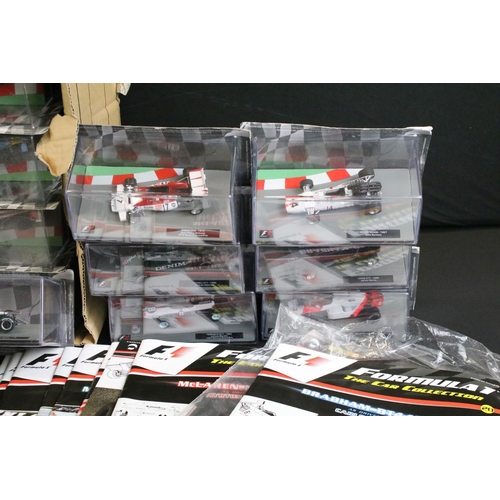 1065 - 35 Cased Panini F1 Formula 1 Car Collection diecast models along with 17 x corresponding magazines, ... 