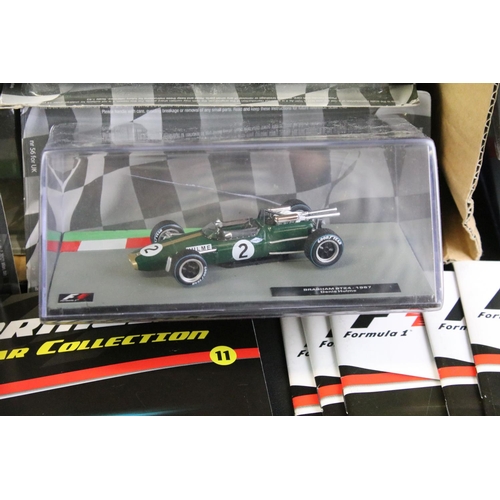 1065 - 35 Cased Panini F1 Formula 1 Car Collection diecast models along with 17 x corresponding magazines, ... 