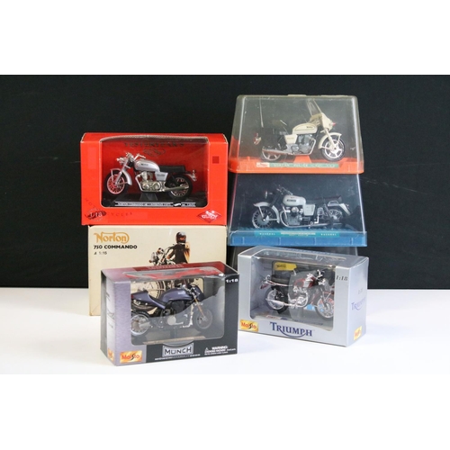 1067 - Seven boxed / cased diecast model motorbikes to include 2 x cased Nacoral models featuring Guzzi 750... 