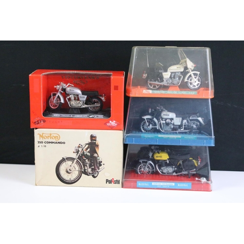 1067 - Seven boxed / cased diecast model motorbikes to include 2 x cased Nacoral models featuring Guzzi 750... 