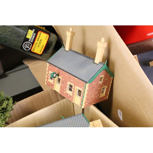 310 - Large quantity of trackside buildings and accessories to include plastic and card examples (numerous... 