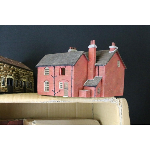 310 - Large quantity of trackside buildings and accessories to include plastic and card examples (numerous... 