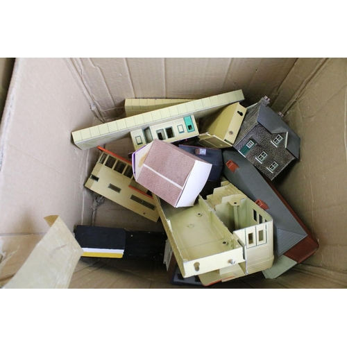 310 - Large quantity of trackside buildings and accessories to include plastic and card examples (numerous... 