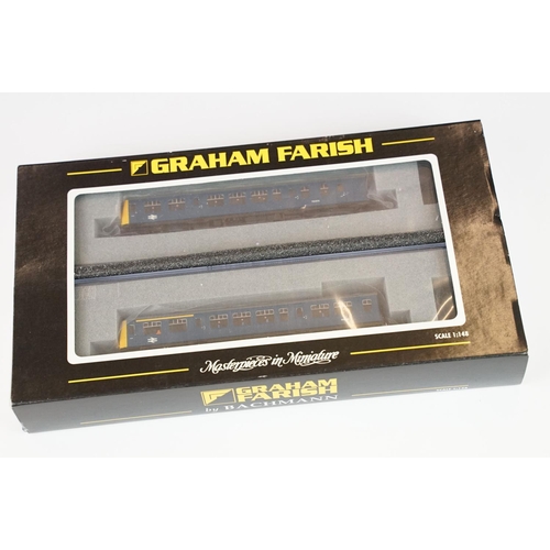 12 - Two cased Graham Farish by Bachmann N gauge DMU sets to include 371-876 Class 108BR blue (2 Car) and... 
