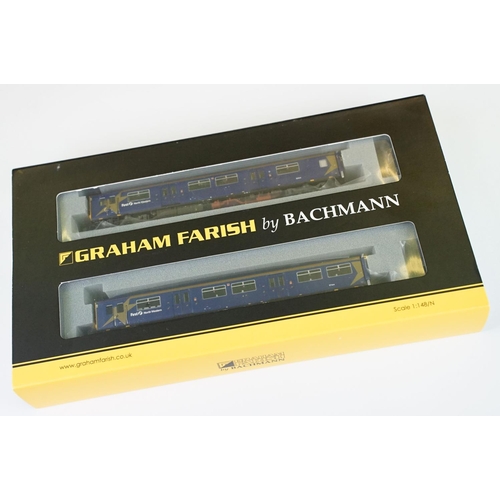 14 - Two cased Graham Farish by Bachmann N gauge DMU sets to include 371-325 Class 150/1 First North West... 