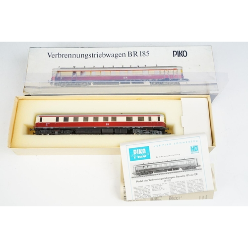 196 - Five boxed HO gauge locomotives and cars to include 3 x Piko (BR185 Verbrennungstriebwagen, E42 and ... 