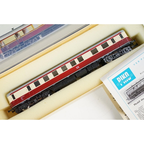 196 - Five boxed HO gauge locomotives and cars to include 3 x Piko (BR185 Verbrennungstriebwagen, E42 and ... 