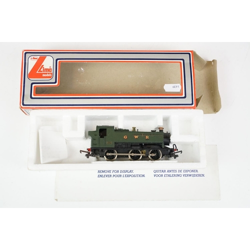 212 - Four boxed OO gauge locomotives to include 2 x Lima (205120MWG & 205117MWG), Palitoy Mainline 37043 ... 