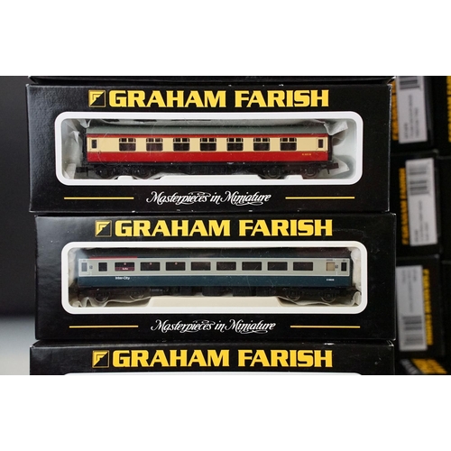 224 - 74 Boxed Graham Farish N gauge items of rolling stock to include coaches, wagons and vans featuring ... 