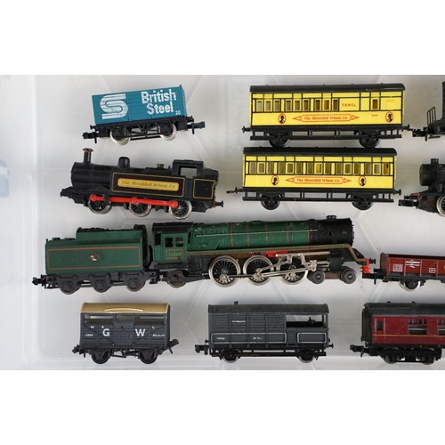 234 - Collection of N gauge model railway to include 3 x locomotives featuring Trix 4-6-2 locomotive with ... 