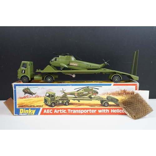 1223 - Seven boxed Dinky military diecast models to include 602 Armoured Command Car, 618 AEC Artic Transpo... 