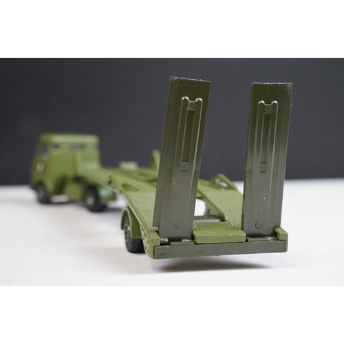 1223 - Seven boxed Dinky military diecast models to include 602 Armoured Command Car, 618 AEC Artic Transpo... 