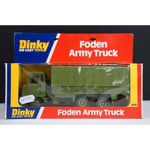 1223 - Seven boxed Dinky military diecast models to include 602 Armoured Command Car, 618 AEC Artic Transpo... 