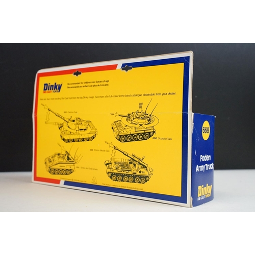 1223 - Seven boxed Dinky military diecast models to include 602 Armoured Command Car, 618 AEC Artic Transpo... 