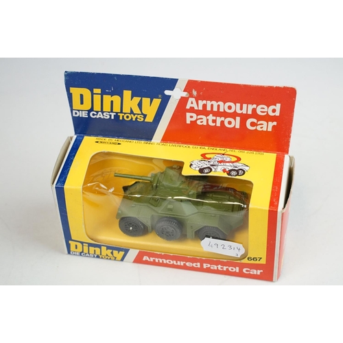 1223 - Seven boxed Dinky military diecast models to include 602 Armoured Command Car, 618 AEC Artic Transpo... 