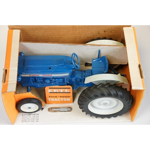 1199 - Boxed ERTL Ford 4000 Tractor diecast model in blue, complete with exhaust stack still sealed in pack... 