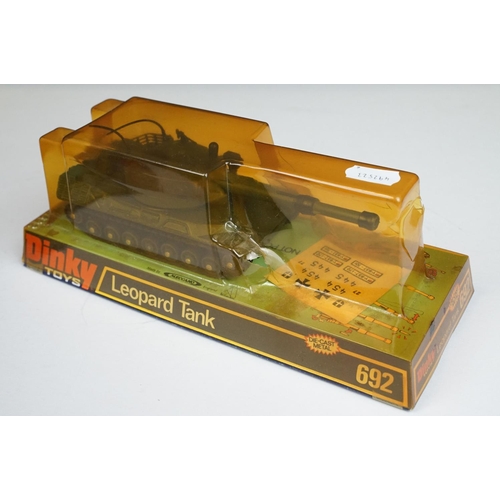 1211 - Six boxed Dinky military diecast models to include 656 88mm Gun, 694 Tank Destroyer, 692 Leopard Tan... 