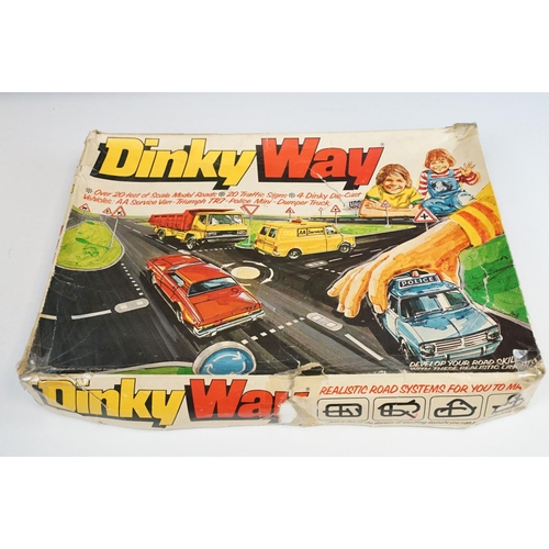 1216 - Four boxed Dinky items to include printed card roadway and road signs, missing instructions and 4 x ... 