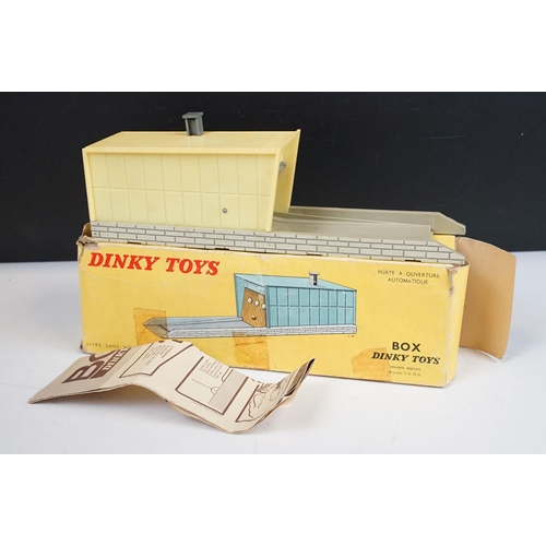 1216 - Four boxed Dinky items to include printed card roadway and road signs, missing instructions and 4 x ... 