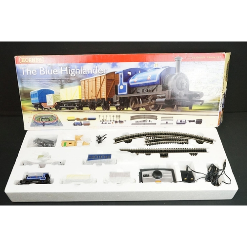 299 - Two boxed Hornby OO gauge electric train sets to include R1101 The Blue Highlander (complete) and R1... 