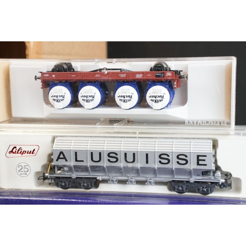 302 - Around 40 boxed HO gauge items of rolling stock to include Marklin, Piko, Roco, Liliput, Rivarossi, ... 