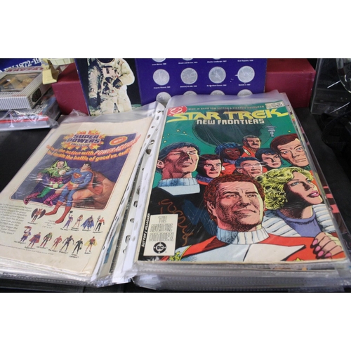 412 - Collection of Sci Fi related comics, toys and collectables to include 27 x DC Star Trek comics featu... 