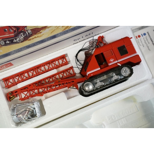 1179 - Three boxed 1/50 scale NZG construction diecast models to include O&K Typ L651 crane in red, Fuchs T... 