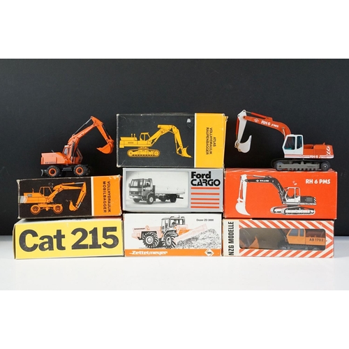 1180 - Seven boxed NZG construction diecast models to include No. 145 Atlas AB 2002 Swing Shovel Excavator,... 