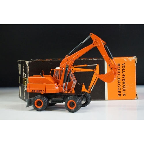 1180 - Seven boxed NZG construction diecast models to include No. 145 Atlas AB 2002 Swing Shovel Excavator,... 