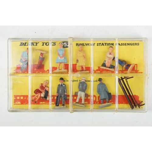 1564 - Quantity of Dinky figures and accessory sets to include 3 x 052 Railway Station Passengers sets and ... 