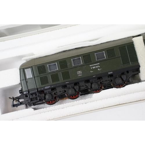 275 - Two boxed HO gauge locomotives to include Trix 22541 Diesel elektrische Doppel-Lokomotive and Guttzo... 