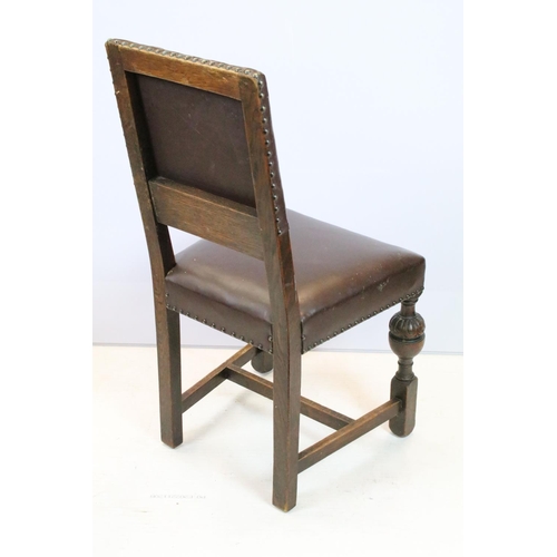 652 - Set of six carved oak dining chairs, including two chairs with arms, upholstered in studded brown le... 