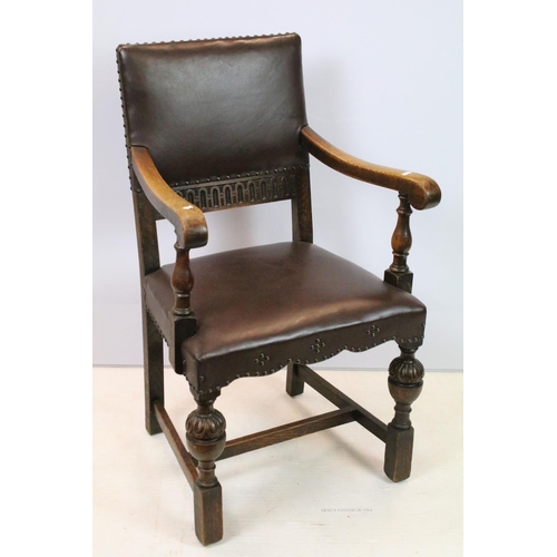 652 - Set of six carved oak dining chairs, including two chairs with arms, upholstered in studded brown le... 