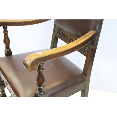 652 - Set of six carved oak dining chairs, including two chairs with arms, upholstered in studded brown le... 