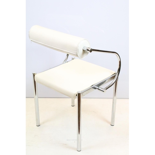 658 - Retro style chair, with tubular chrome frame and white leatherette round cushioned back and white le... 